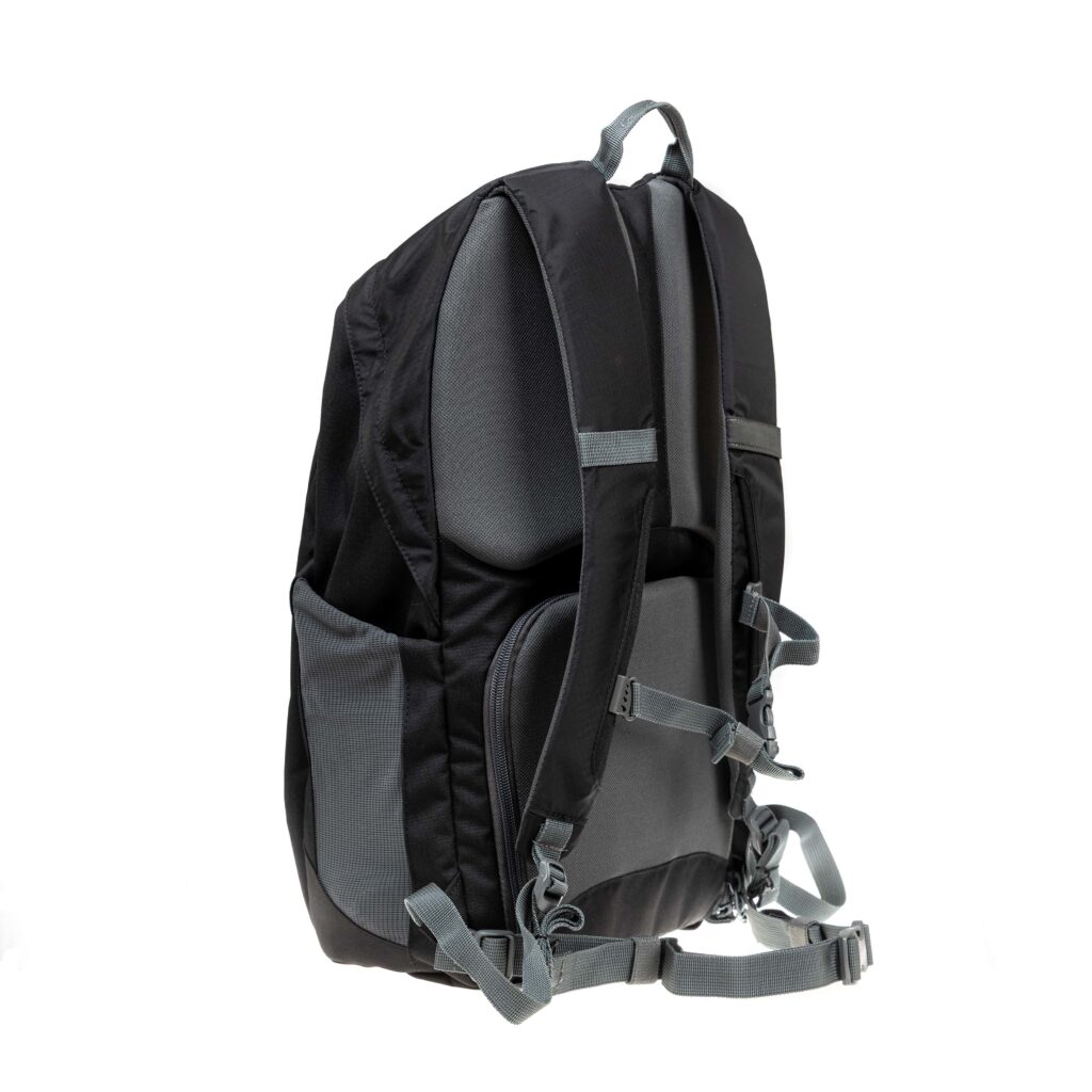 Image of a 45 degree angle view of the back of a black backpack